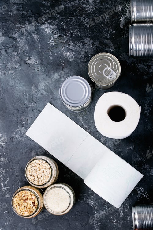 Preview: Canned Food In Metal Cans With Toilet Paper Over Dark Texture Background. Copy Space. Food Supply