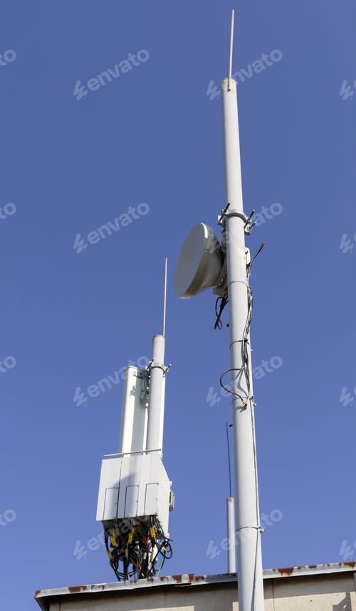 Preview: Tower With Aerials Of Cellular On A Background Blue Sky