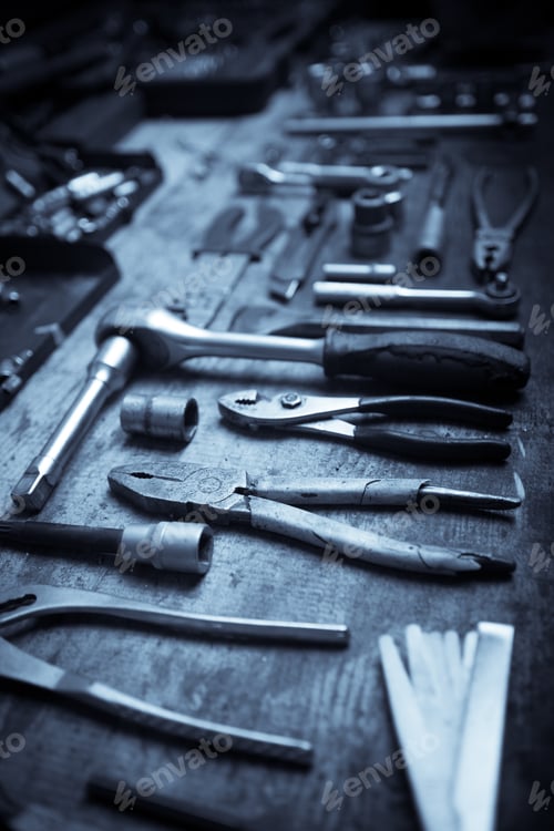 Preview: Color Image Of Many Tools On A Wooden Plank.