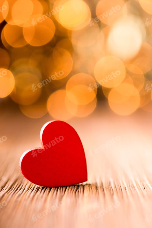 Preview: Red Heart-Shaped On A Wooden Background.