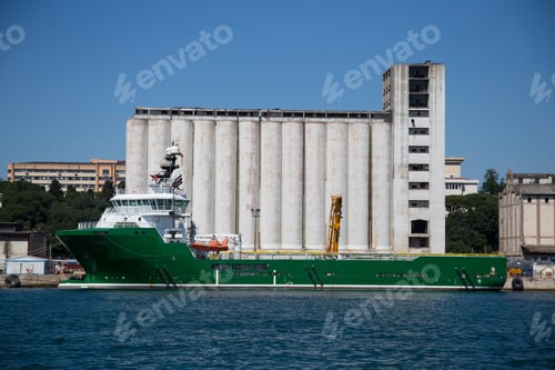 Preview: Ship In Front Of A Port Silo