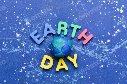 Preview: Colorful Earth Day Decoration on a Blue Surface
