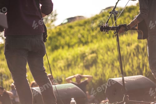 Preview: Detail Of Rock Band Musicians Seen From Behind While Playing Live