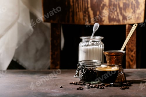 Preview: Fresh Coffee In Glass Cup With Sugar And Coffee Beans Over Brown Wooden Background. Top View, Flat