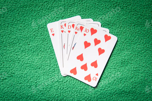 Preview: A Hand Of Playing Cards Showing A Royal Straight Flush In Hearts.
