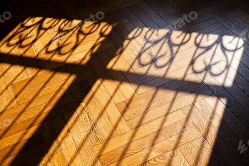 Preview: Sunlight From Window With Iron Fence, Falling On Wooden Floor In Dark Room