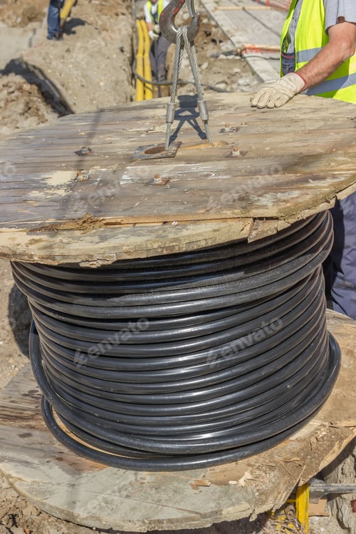 Preview: Industrial Cable Installation, Installing New Ground Infrastructure In The Street. Workers Unrolls