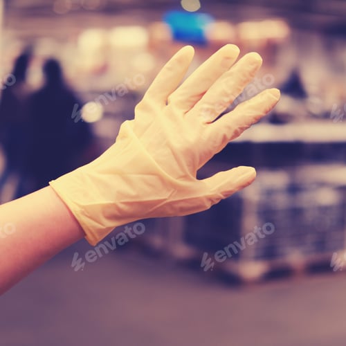 Preview: Hand In A Medical Glove On The Background Of The Store. Disinfection And Cleaning Concept For Virus