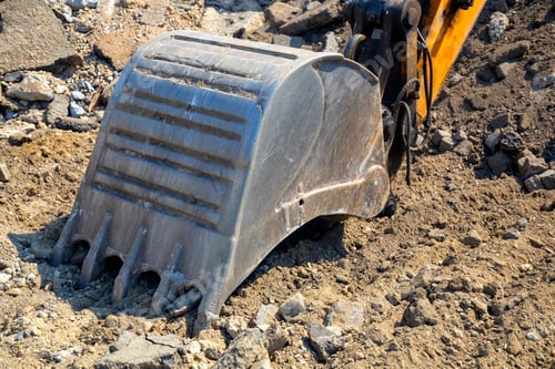 Preview: Excavator Bucket Breaks Asphalt At Construction Site. Excavator Shovel Removing Construction Waste