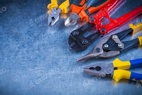 Preview: Set Of Bolt Cutter Tin Snips Cutting Pliers Gripping Tongs On Scratched Vintage Metallic Surface