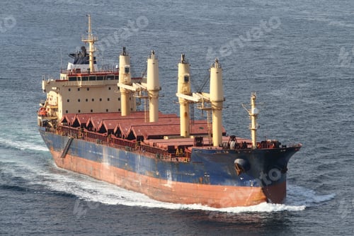 Preview: A Cargo Ship Carrying Goods Between Ports