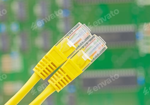 Preview: Yellow Network Connector Wire On Background Electronic Circuit Board