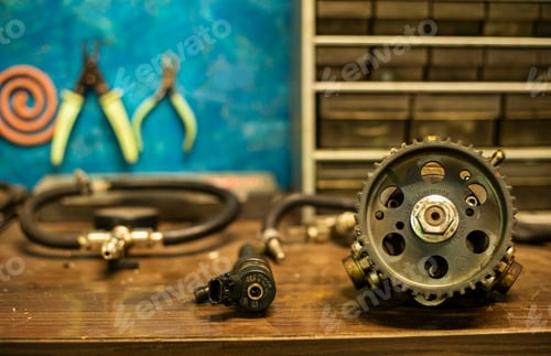 Preview: Spare Car Engine Resting On The Mechanical Workshop Bench