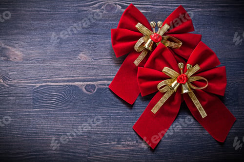 Preview: Christmas Red Knots On Wooden Board Holidays Concept.