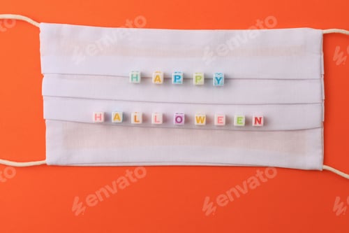 Preview: Happy Halloween Lettering. Medical Surgical Mask As Symbol Of The Pandemic.