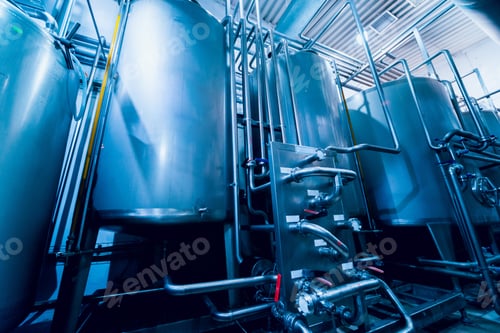 Preview: Modern Interior Of A Brewery. Barrels And Pipes. Factory Interior. Industry Background
