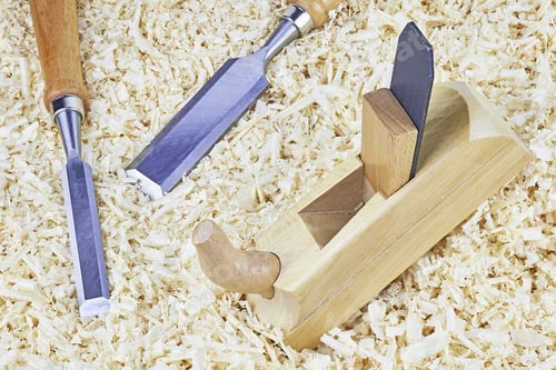 Preview: Two Chisels And One Spokeshave Lying In Wooden Shavings