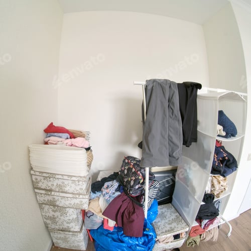 Preview: Things Folded In A Wall Niche And Clothes On A Floor Hanger, Junk Close Up