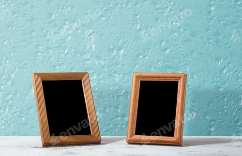 Preview: Wooden Photo Frames On Table, Blue Wall