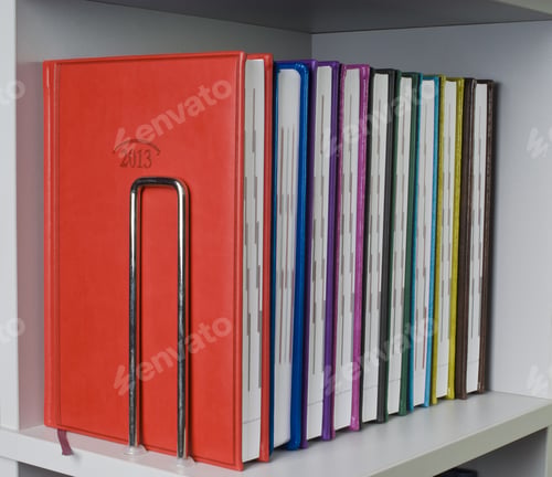 Preview: Close-Up Of A Few Colored Books (Notebooks, Diaries).