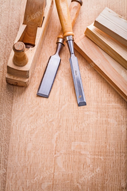Preview: Two Chisels Woodworkers Plane And Wooden Planks On Board With Copyspace