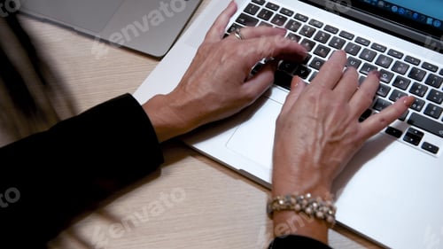 Preview: Woman Hand Working On A Notebook Using Touchpad And Keyboard, Close Up. Slow Motion
