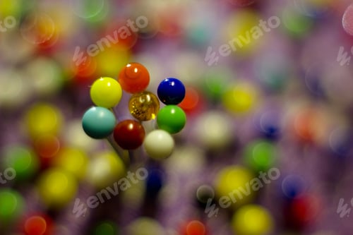 Preview: Color Sewing Pins And Detail Of Reflection For Colored Abstract Background.
