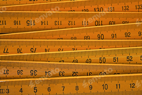 Preview: Yellow Wooden Meter On Wood Board Horizontal Image Construction Concept.