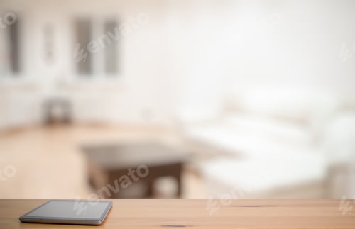 Preview: Tablet On Wooden Table In The Living Room