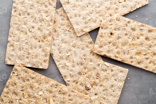 Preview: Stack Of Wholegrain Crispy Bread With Sunflower, Chia And Sesames Seeds