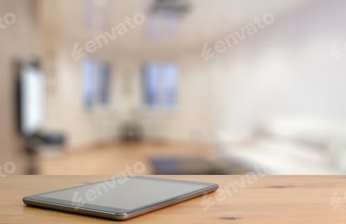 Preview: Tablet On Wooden Table In The Living Room