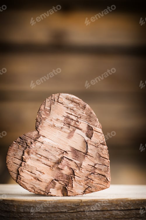 Preview: Bark Heart On Wooden Background. Studio Photography.