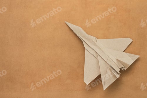 Preview: Origami Paper Airplane Mockup. Selective Focus. Old Vintage Craft Background