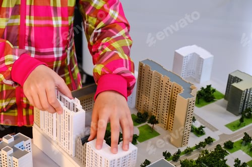 Preview: A Child Builds A Model Of The House, Streets And Areas Of The City