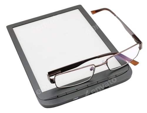 Preview: The Glasses Are Lying On The Book Reader On White Background