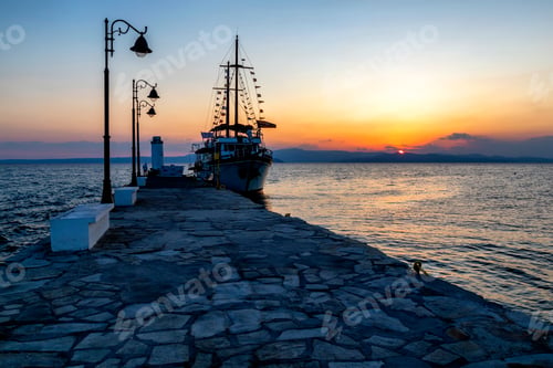 Preview: Tourist Boat At The Pier At Sunriset Time In Pefkohori, Greece.