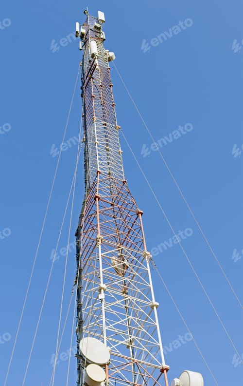 Preview: Tower With Aerials Of Cellular On A Background Blue Sky