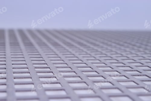 Preview: Perforated Stainless Metal Sheet On White Background.