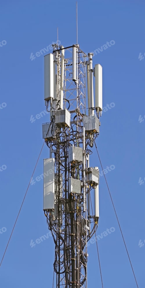 Preview: Tower With Aerials Of Cellular On A Background Blue Sky