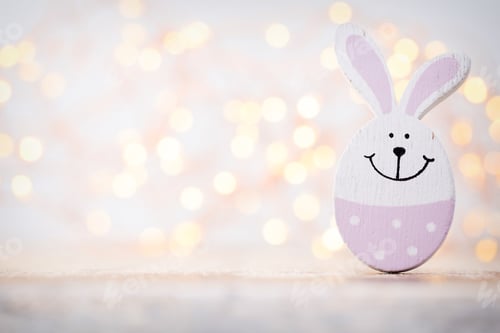 Preview: Wooden Easter Rabbits On The Bokeh Background.