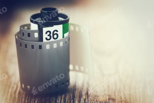 Preview: Old Photo Film Cassette. Retro Stylized Photo With A Glow Effect. Copy Space For Text.
