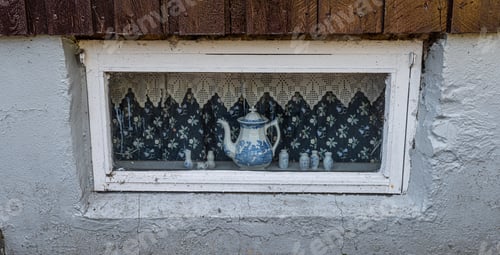Preview: White And Blue Porcelain Tea Pot In A Small Cellar Window.