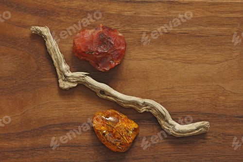 Preview: Carnelian, Amber And Dry Tree. Collection Of Natural Rough Stones On A Natural Wooden Background