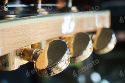 Preview: Electric Guitar Headstock And Tuning Pegs Detail With Light Effect, Selective Focus
