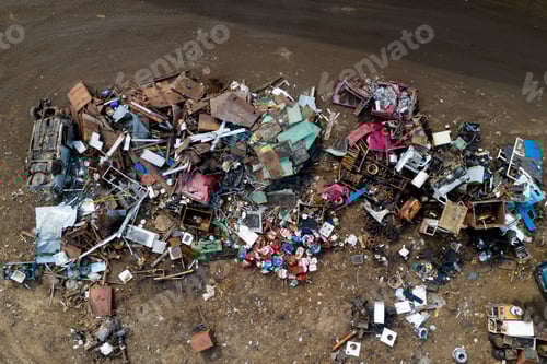 Preview: A Pile Of Scrap Metal On The Ground Top View. Secondary Use Of Metal.