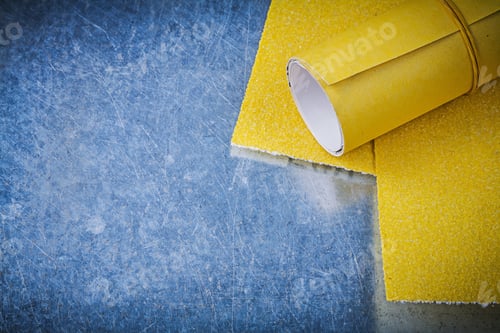 Preview: Yellow Sandpaper On Scratched Metallic Background Abrasive Materials.
