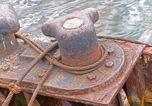 Preview: Big Old Rusty Bollard On A Stone Pier
