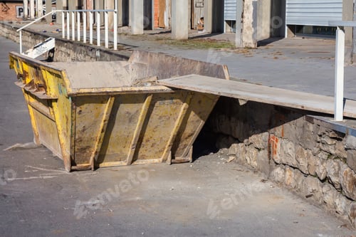 Preview: Trash Container For Concrete Debris. Construction Waste Container. Made With Shallow Dof.