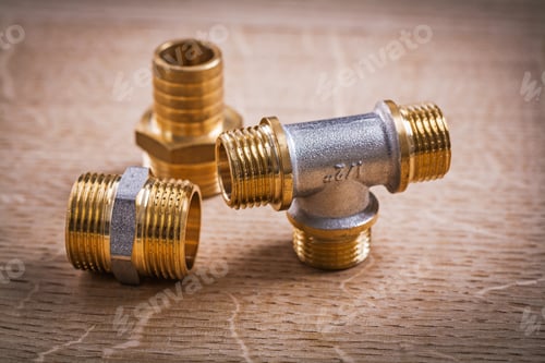 Preview: Pipe Connectors On Wooden Board