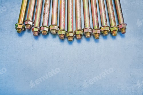 Preview: Composition Of Anchor Bolts For Concrete Walls With Nuts On Metallic Background Construction Concept